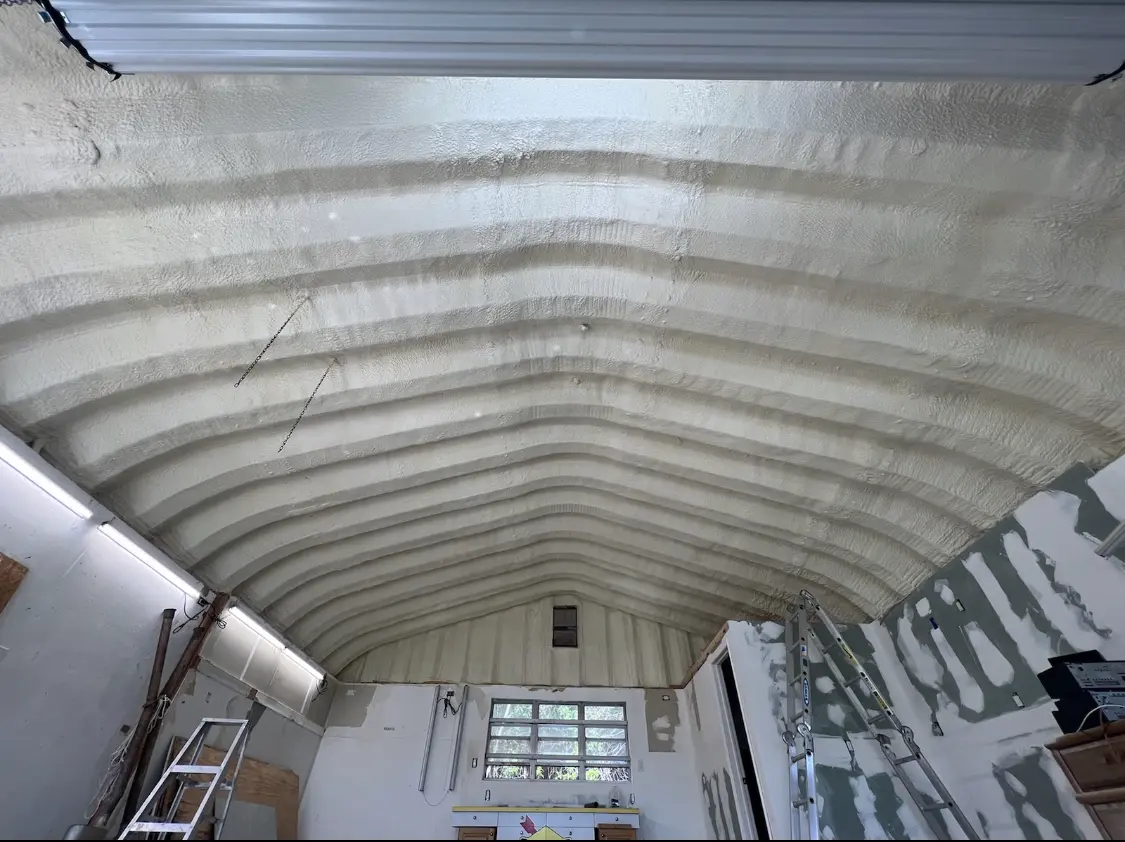 Spray polyurethane foam applied to the underside of a metal roof deck in Caldwell